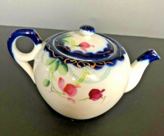 Vintage Takito Co hand painted teapot made in Japan white w/ floral design 3