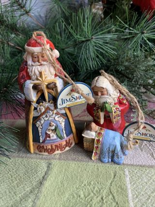 Two “jim Shore” Heartwood Creek Santa’s - Hanging Ornaments