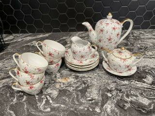 Vintage Porcelain Child’s 14 Piece Tea Set