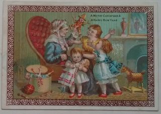 Victorian Chromo,  Christmas Card By Goodall.  Grandma,  Children,  Toys.  10x7cms