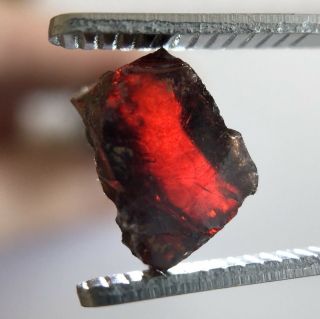 9.  06 Ct Rough Rare Pyrope - Almandine Garnet.  Facet Grade Hand Mined