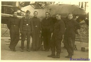 Port.  Photo: RARE Luftwaffe Airmen Posed by Me - 109 Fighter Plane Under Repair 2