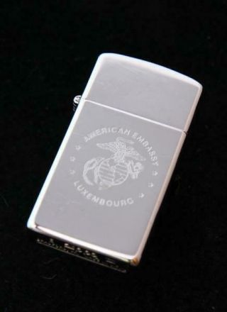 Vintage Slim Zippo Lighter 1991 American Embassy Luxembourg High Polish Chorme