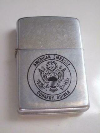 Vintage Zippo Lighter 1978 American Embassy Guinea Brushed Chrome