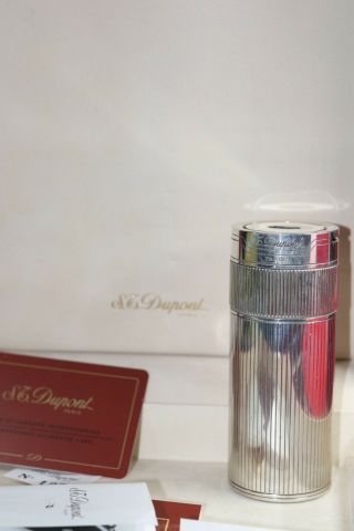 S.  T.  Dupont Cylinder Table Lighter Silverm And Papers