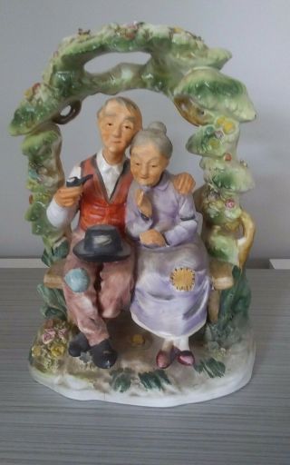 Norleans Bisque Porcelain - Old Man & Woman On Bench Under Arbor