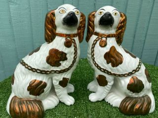 Pair 19thc Staffordshire Seated Copper Lustre & White Spaniel Dogs C1880s