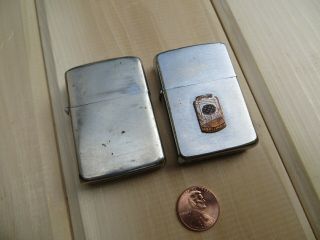 2 Vintage Zippo Lighters - One With Advertising -