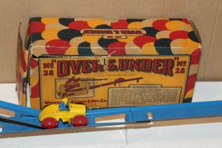VINTAGE WOLVERINE OVER and UNDER WIND UP TOY with BOX 2