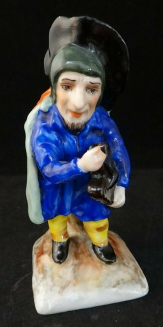 Antique Capodimonte Porcelain Figure,  Dwarf Wearing A Cape & Hat.  4 1/8” T.