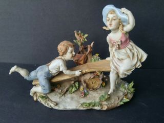 Benacchio Signed Italy Triade Porcelain Figurine - Boy & Girl On Seesaw