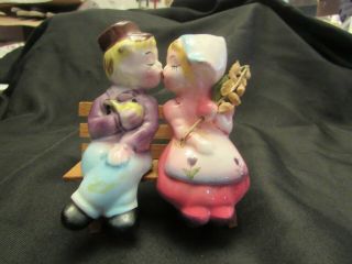 Vintage Kissing Dutch Boy And Girl Sitting On A Bench Salt And Pepper Shakers
