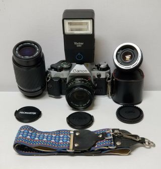 Vintage Cannon Ae - 1 Program 35mm Camera W/ Lenses & Vivitar Flash