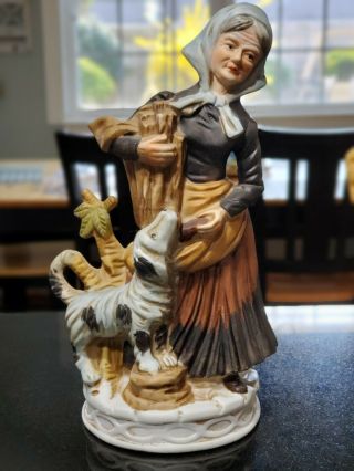 Vintage Flambro 9 3/4 " Porcelain Figurine Old Woman With Dog Carry Wood
