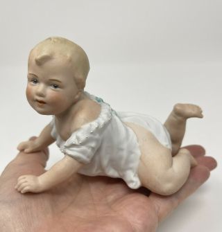 Antique Heubach Piano Baby Boy Bisque Figurine,  5” Long,  Germany