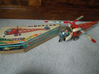 Vintage Helicopter With Active Pilot Friction Powered Mf110 Red China Tin Toy