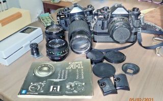 Two Vintage Canon A - 1 35mm Cameras W Lens,  More