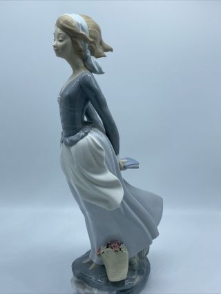 Lladro Porcelain Figurine Lady In The Wind With Book Number C 22a.