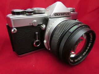 Vintage Olympus Om1 - 1n 35mm Film Camera With A 50mm Zuiko Olympus Lens F1.  4