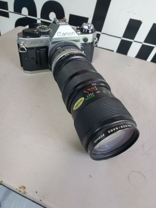 Vintage AE1 Canon Camera with a 50mm Camera Lens and Strap 2