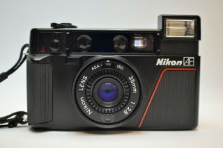 Vintage Nikon L35af 35mm F/2.  8 Lens Point & Shoot W/ Case