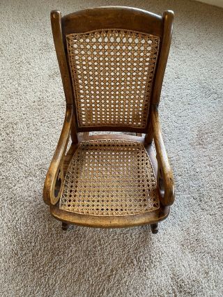 Antique Child’s Wooden Rocking Chair With Cane Seat -