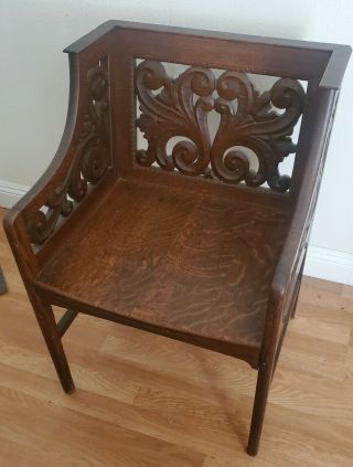 Antique Solid Wood Chair With Carved Scrollwork