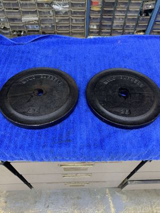 Two Vintage 25 Lb Milo Barbell Standard Weight Plates & 4 Milo 10 Pound Weights.