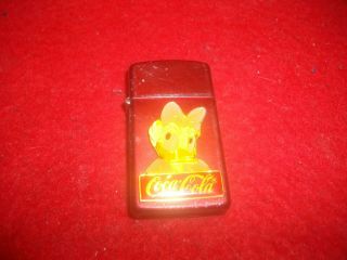 Disney / Coke Zippo Lighter Dasey Duck Slim