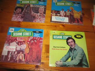 4 vintage Sesame Street 45 Records, .  Snuffalufagus sings 3