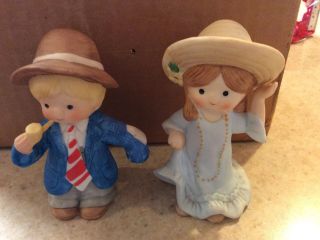 Enesco Country Cousins - 2 Piece Figurines - Scooter & Katie Playing Dress Up