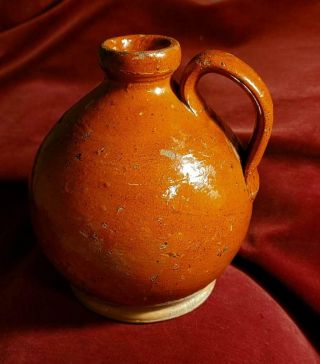 A Wonderful Early 19th Cen.  Bulbous Redware Jug Applied Strap Handle