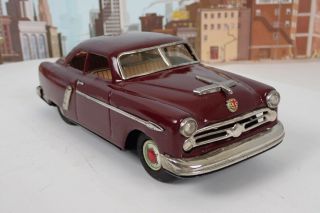 Vintage Marusan Kosuge Tin Friction 10 - 1/4 " Long 1952 Maroon Ford Sedan