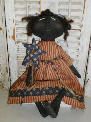 Primitive Grungy Folk Art Black Doll With Star