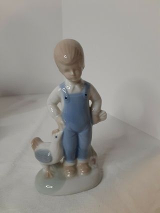 Vintage Japanese Porcelain/ceramic Blue And White Boy Figurine With Chicken