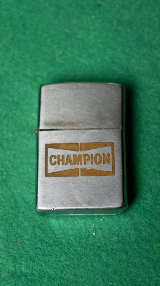 Vintage Champion Spark Plug Zippo Lighter - 1974