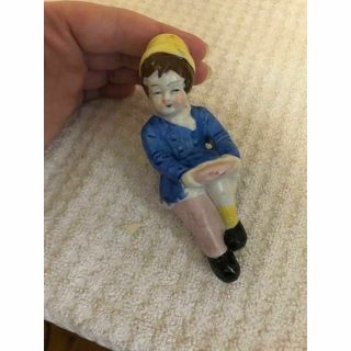 Vintage Occupied Japan Shelf Sitter Figurine Boy Pulling Up Pant Leg