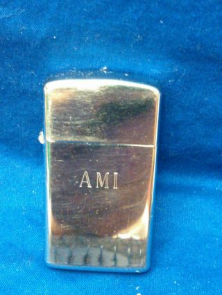 Vintage Zippo Slim 1979 Cigarette Lighter Polished Chrome Engraved " Ami