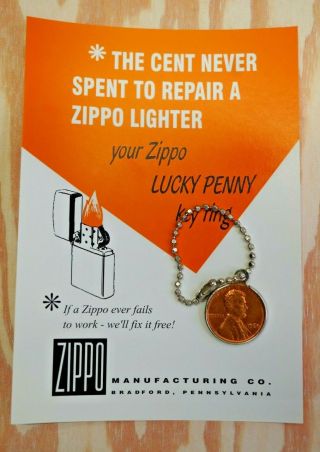 1960 Coin / Keychain W/card.  Zippo Cent Never Spent To Repair A Zippo Lighter.