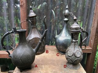 Four Islamic Brass & Copper Ewers - 18th / 19th Century.