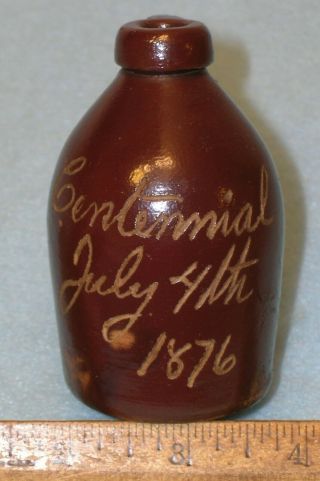 1876 Centennial Miniature Stoneware Jug Centennial July 4th 1876 3.  25” High