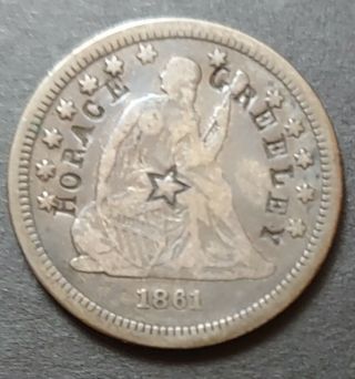 Horace Greeley Counterstamp On 1861 Seated Liberty Quarter