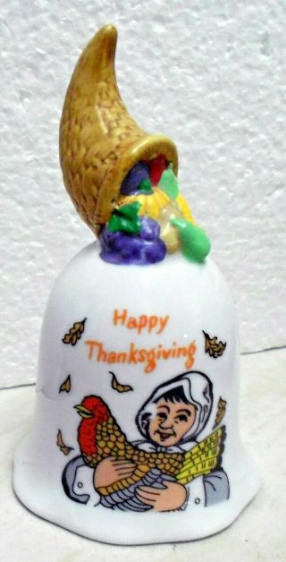 Vintage Porcelain Bell With Happy Thanksgiving On It.  And has a Pumpkin Ringer. 2