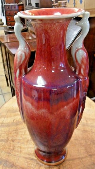 A Chinese Vase Of Baluster Form W/ Peacock Handles In A Sang De Boeuf Glaze