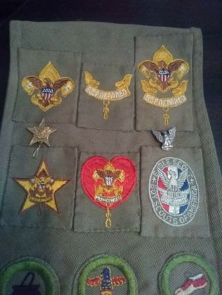 1930 - 1940 BOY SCOUT SHASH WITH SAND COLOR EAGLE SCOUT PATCH,  21 MERIT BADGES AND 2