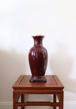 Mid 20th C 17.  5” Tall Sang De Boeuf Oxblood Chinese Vase With Rosewood Base