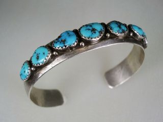 Vintage Navajo Sterling Silver & 7 Turquoise Row Bracelet