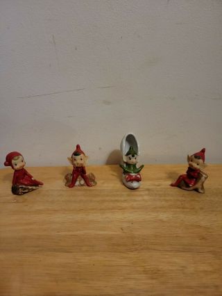 Vintage Christmas Set Of 4 Pixie Elf In Red Suit Sitting On Log Figurine Japan