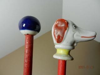2 Vintage Carnival Canes.  1 With Dog Head Top.  1 With Blue & White Orb Top.