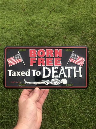Rare Vintage Metal Born Taxed To Death Booster License Plate Skeleton Flags